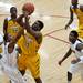 Ypsilanti senior Lavonte Davis shoots after grabbing a rebound in the game against Saginaw High on Tuesday, March 19. Daniel Brenner I AnnArbor.com